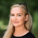 Dr. Melanie H. Adamek